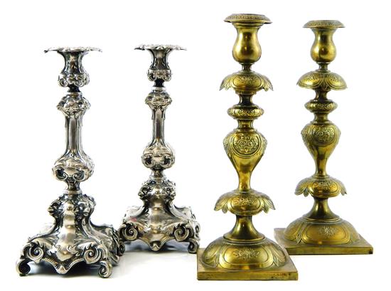 Appraisal: Two pair of metal repousse candleholders pair of brass candleholders