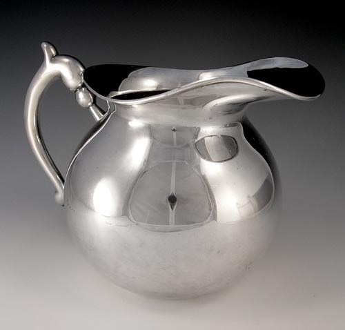 Appraisal: CAMUSSO STERLING WATER PITCHER Marked Industria Peruvian Sterling Camusso on