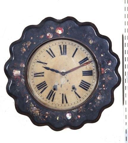 Appraisal: A TH CENTURY STYLE CLOCK with Roman Numerals and wavy