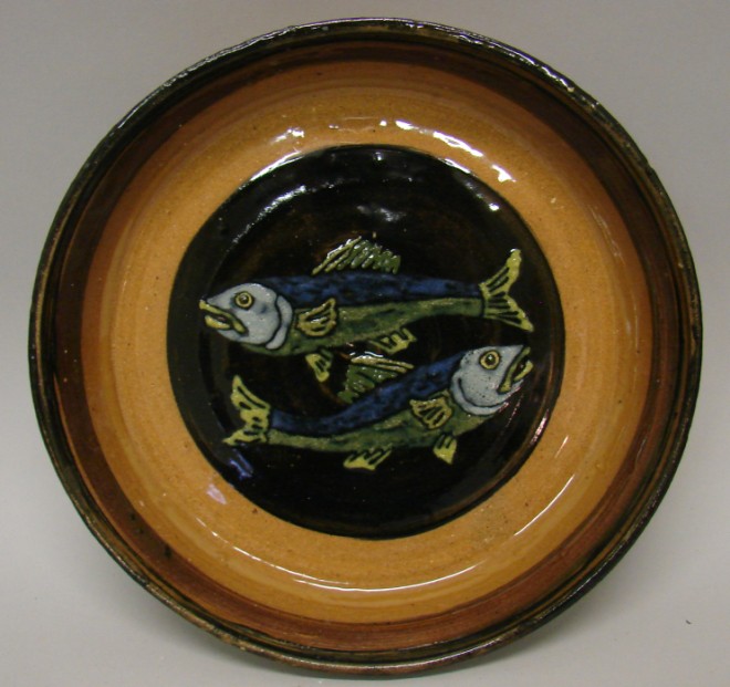 Appraisal: Plate - with fish decoratione inside brown black Feed The