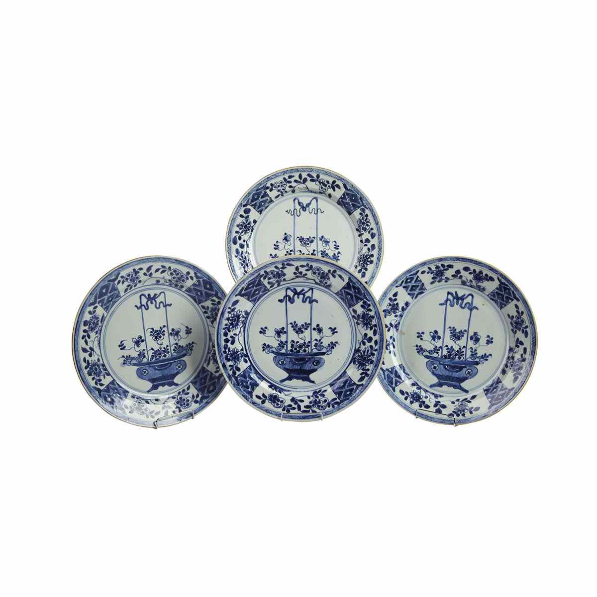 Appraisal: Four Export Blue and White Floral Bouquet T Plates Kangxi