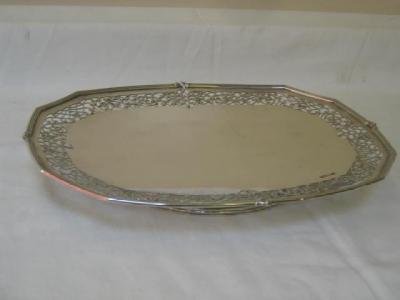 Appraisal: A CAKE STAND of pedestal canted oblong form with reeded