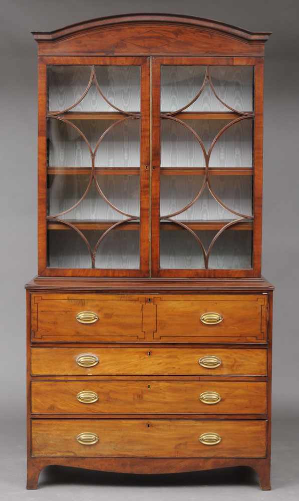 Appraisal: REGENCY INLAID MAHOGANY SECRETAIRE BOOKCASE The breakarch crest above a