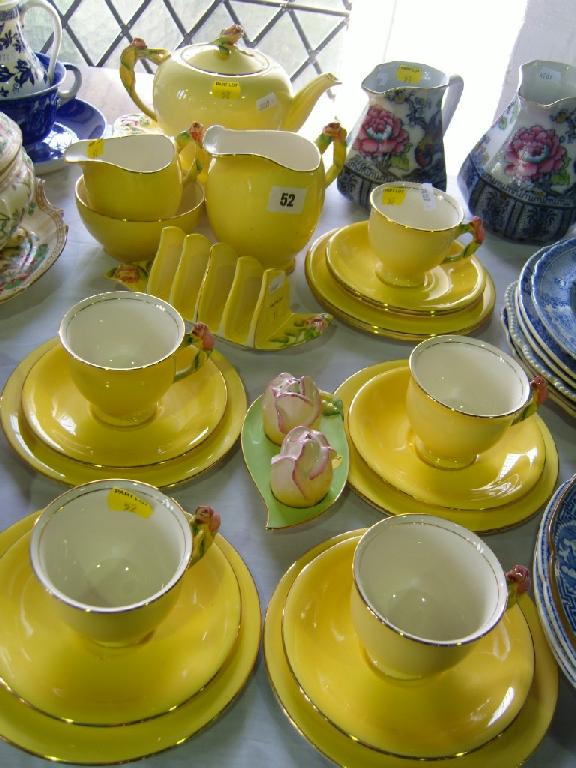 Appraisal: A collection of Grimwades Royal Winton yellow ground teawares with