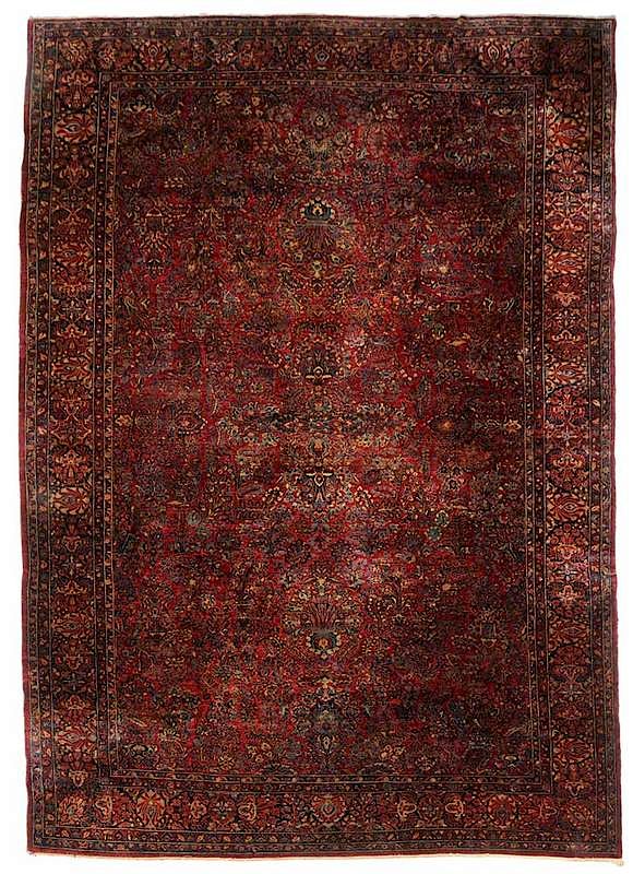 Appraisal: Large Sarouk Carpet Persian early th century ruby red ground