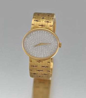 Appraisal: A Ladies' Diamond Dial and k Gold Watch by Baume