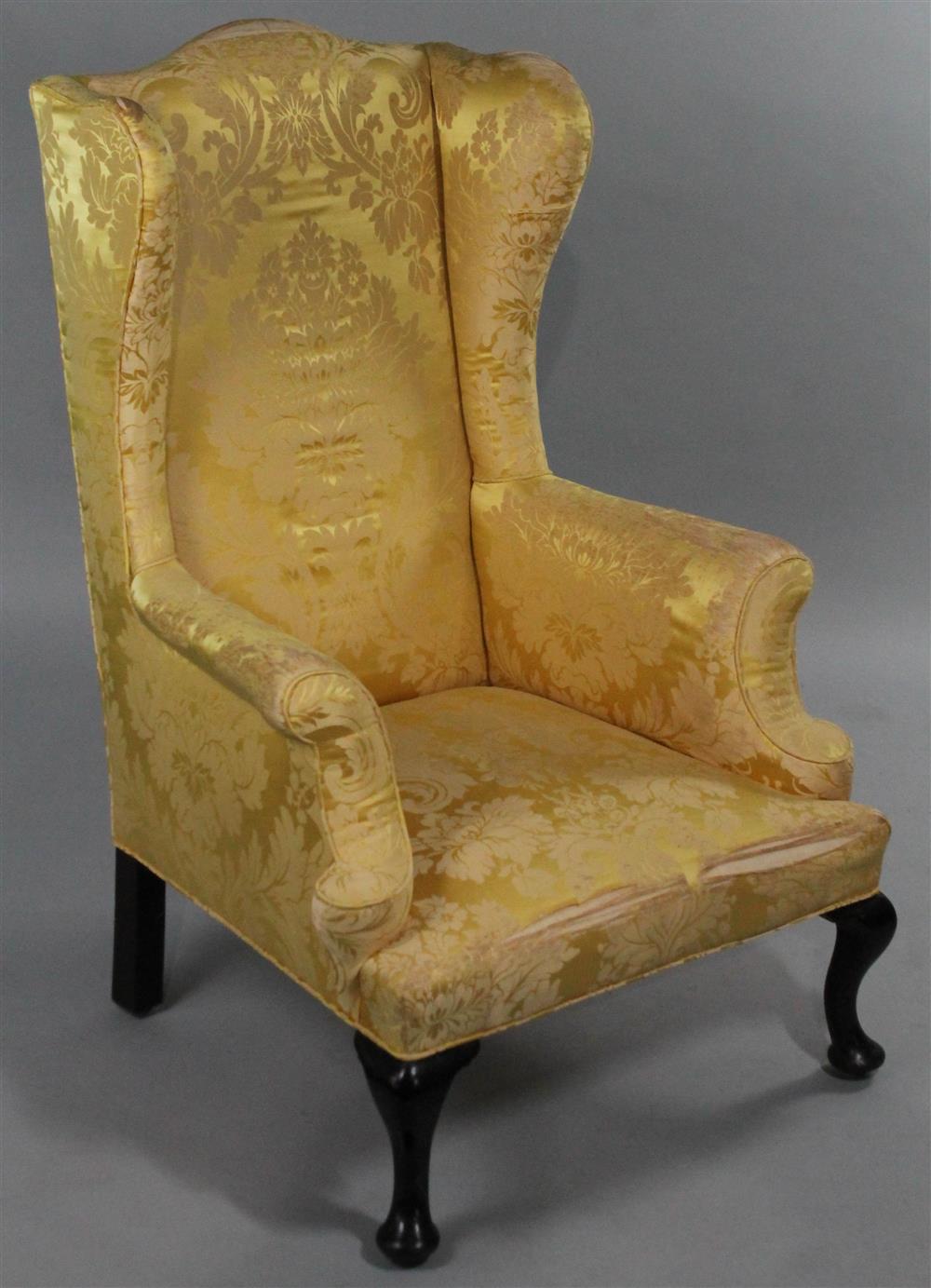 Appraisal: QUEEN ANNE STYLE WING CHAIR having a shaped arched back