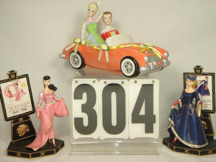 Appraisal: Set of three repro vintage Barbie doll figures The car