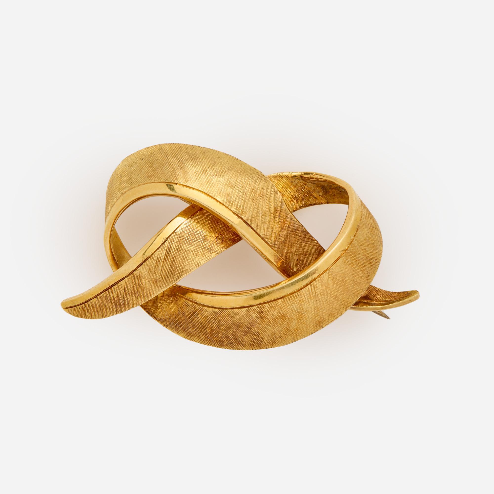 Appraisal: MID-CENTURY RIBBON MOTIF BROOCH IN K k yellow gold mid-century