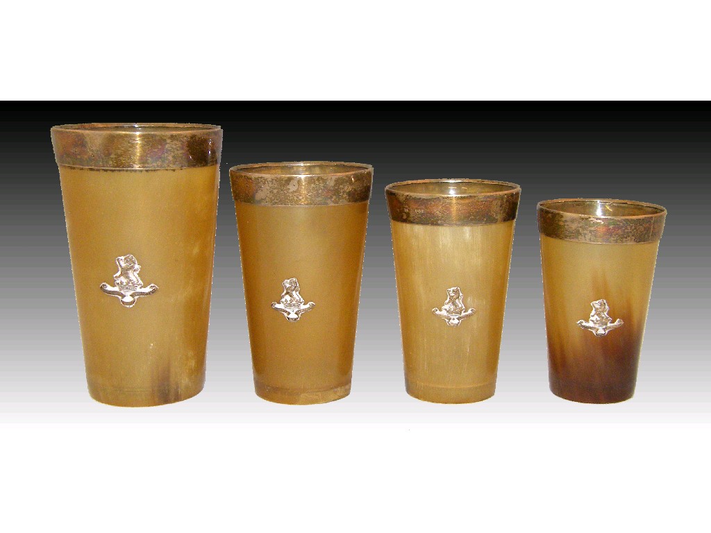 Appraisal: Victorian graduated set of four silver mounted fawn beakers applied