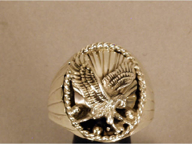 Appraisal: Large sterling silver gentlemen's eagle ring Estimate -