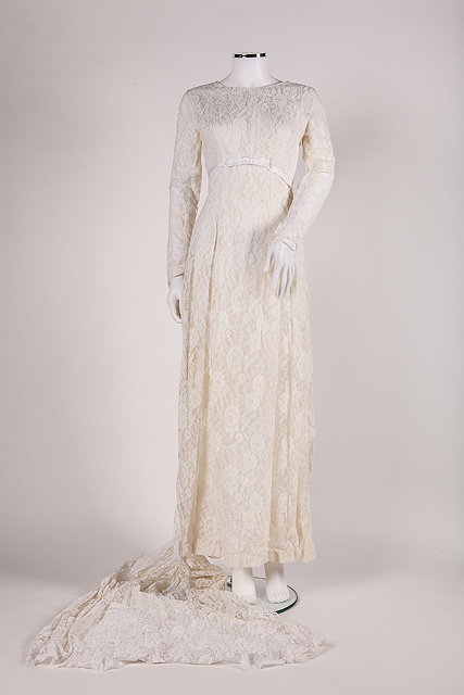 Appraisal: A vintage white lace wedding dress with long train attached