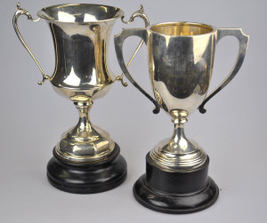 Appraisal: Two silver two-handled trophy cups oz on ebonised socles