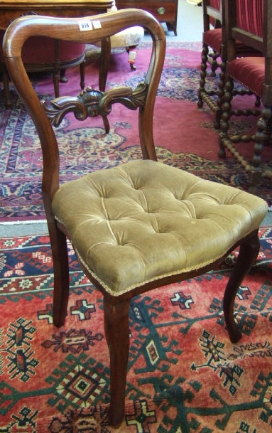 Appraisal: A set of four Victorian rosewood framed dining chairs with