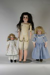 Appraisal: DOLLS - Lot of three A M dolls and one