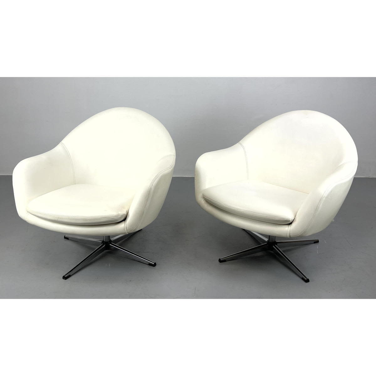 Appraisal: Pr Overman of Sweden swivel lounge chairs Chrome bases Dimensions