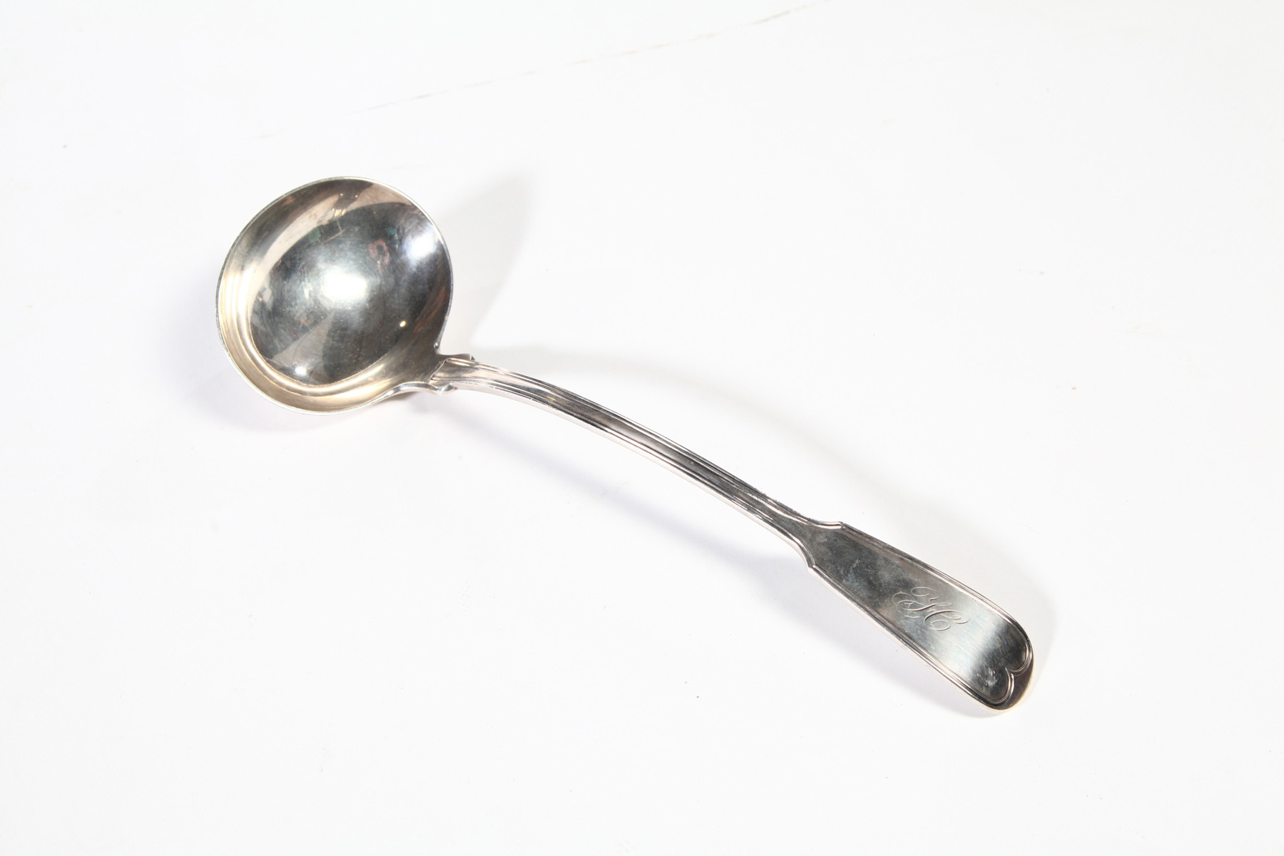 Appraisal: STERLING SILVER LADLE English th century Sterling silver ladle monogrammed