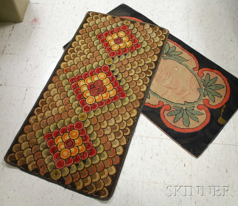 Appraisal: Two Hooked Rugs a geometric pattern and a floral and