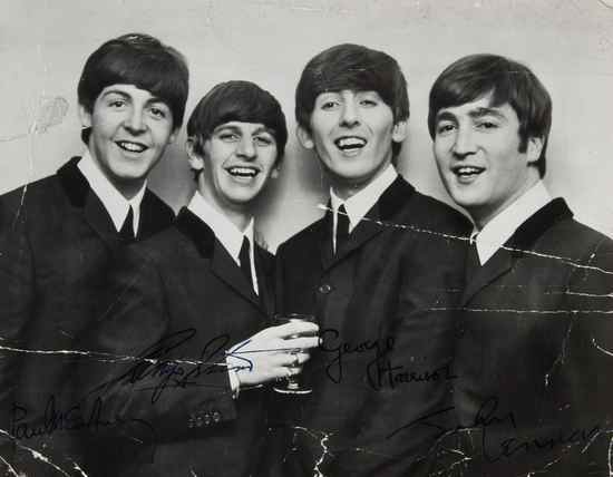 Appraisal: Beatles The An early photograph of the Beatles signed by