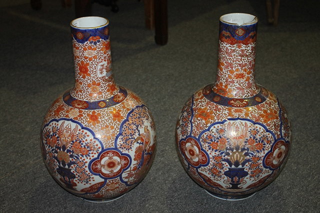 Appraisal: A PAIR OF LARGE JAPANESE IMARI PORCELAIN BOTTLE VASES each