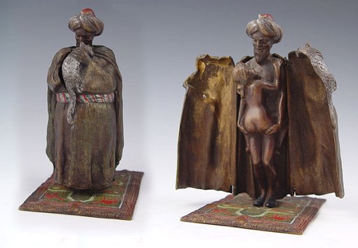 Appraisal: BERGMAN MECHANICAL ARAB NUDE BRONZE WITH CAT Arab's coat opens