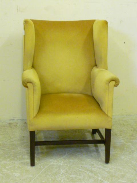 Appraisal: A GEORGIAN MAHOGANY WING ARMCHAIR early th century upholstered in