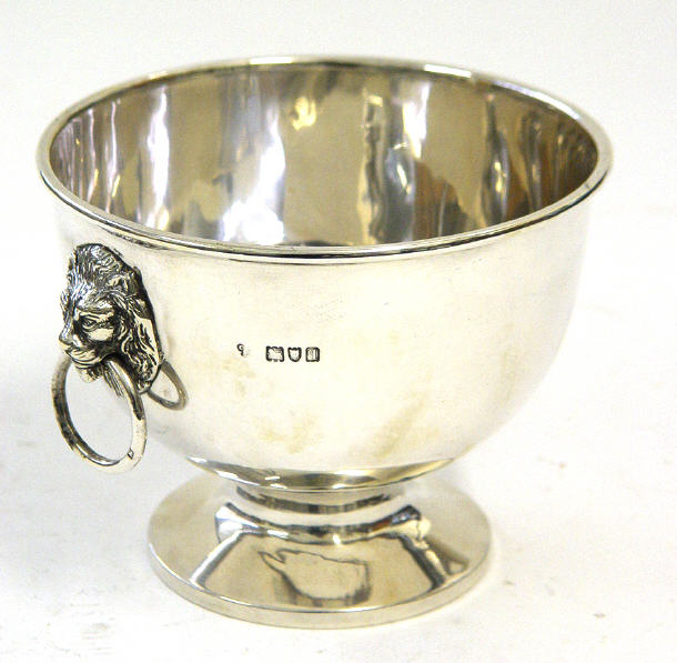 Appraisal: Silver pedestal bowl with lion mask handles London cm high