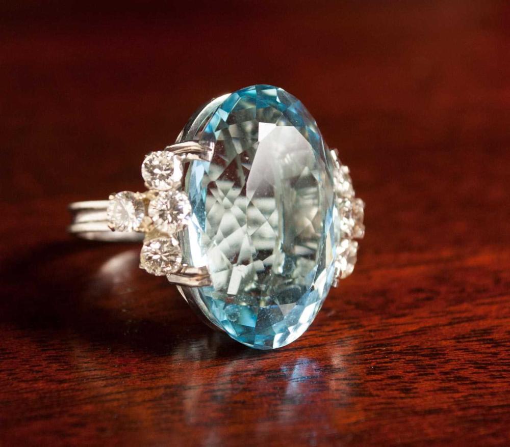 Appraisal: FORMAL DIAMOND AQUAMARINE AND FOURTEEN KARAT GOLD RING The k