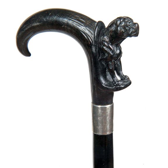 Appraisal: Mastiff Ebony Dress Cane Ca - An ebony carved one-piece