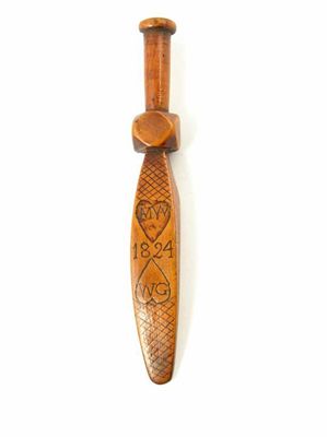 Appraisal: A Regency treen love token knitting sheath with an octagonal