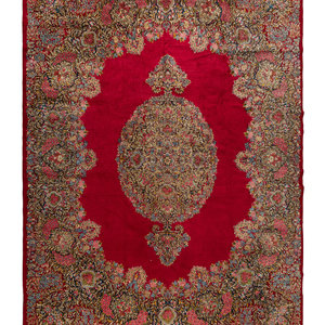 Appraisal: A Kirman Wool Rug th Century feet inches x feet