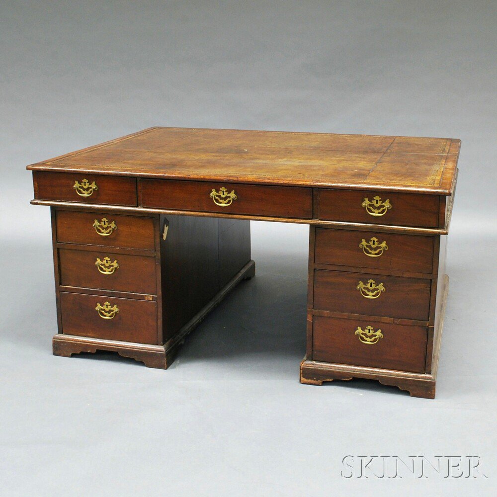 Appraisal: Georgian-style Mahogany Veneer Partner's Desk the rectangular top with tooled