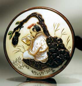 Appraisal: CONTEMPORARY INLAID NETSUKE Exquisitely carved manju netsuke by Bill Shotts