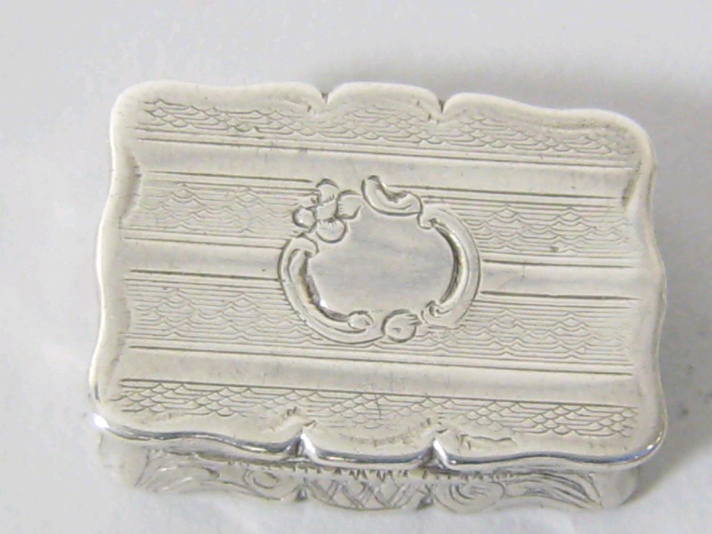 Appraisal: A Victorian small rectangular Vinaigrette with shaped rim vacant rococo