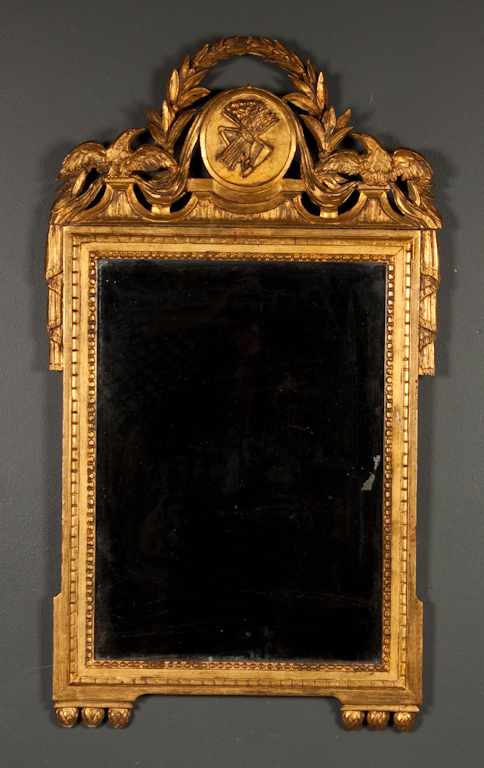 Appraisal: Italian carved giltwood mirror th century top with eagle figure