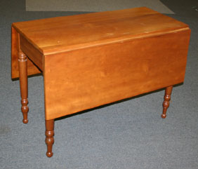 Appraisal: Mixed woods drop leaf table turned legs ca th century