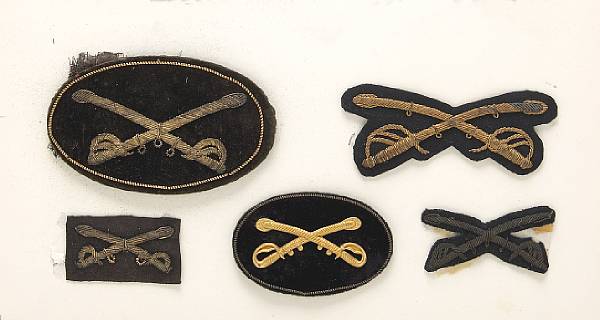 Appraisal: A group of five Pattern cavalry officer's cap insignia Including