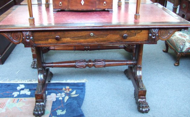 Appraisal: A George IV rosewood library table with later leather inset