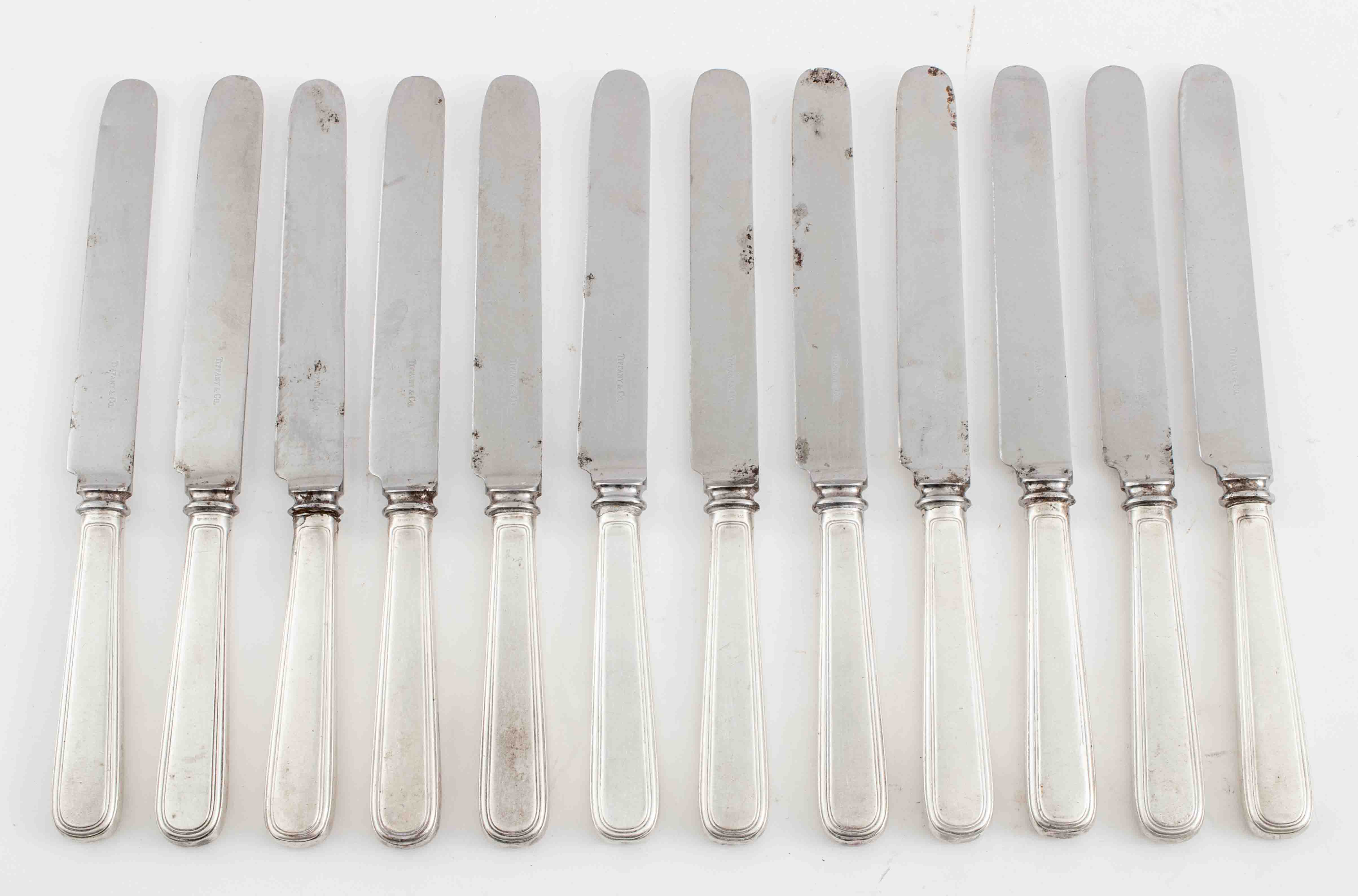 Appraisal: TIFFANY CO STERLING SILVER BUTTER KNIVES Twelve Tiffany and Company