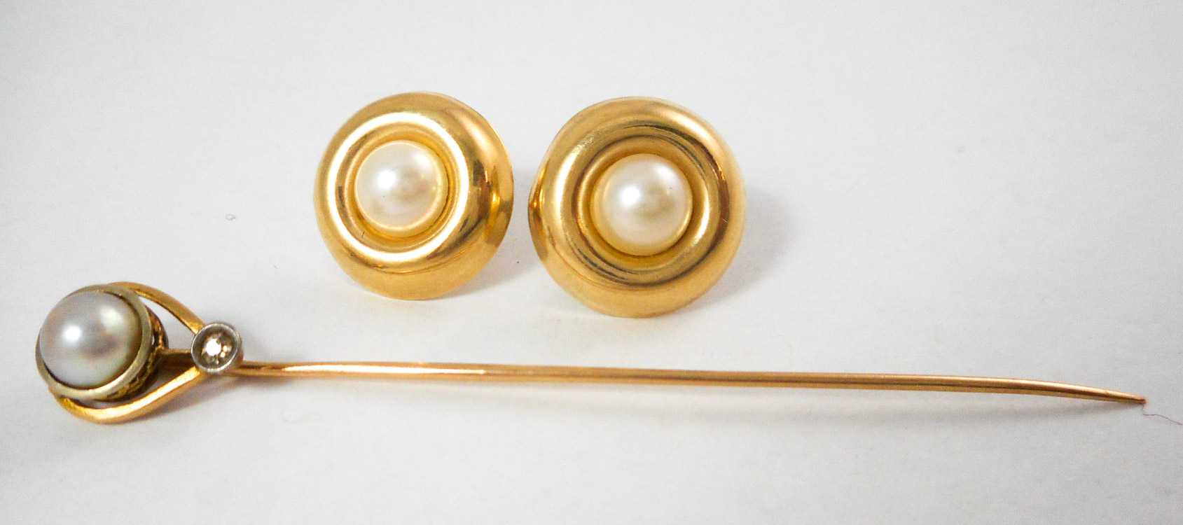 Appraisal: THREE ARTICLES OF PEARL JEWELRY including a k yellow gold