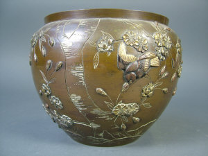 Appraisal: A late th early th century Japanese bronze jardiniere inlaid