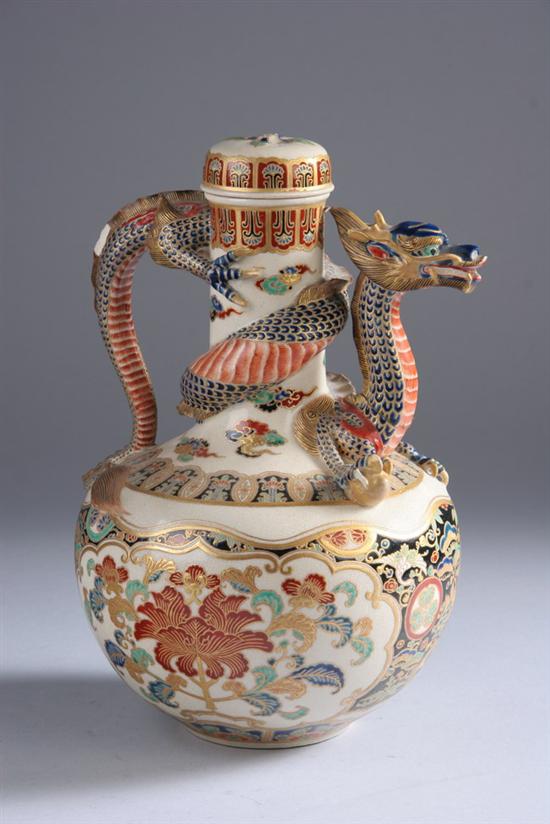 Appraisal: JAPANESE SATSUMA EARTHENWARE EWER Meiji period Dragon-form spout and handle