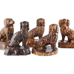 Appraisal: Five Rockingham Glaze Spaniel Figures th Century Height of largest