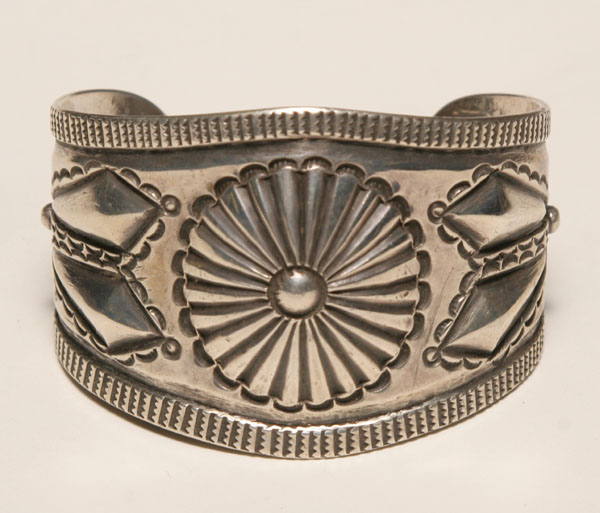 Appraisal: Native American artisan silver bracelet with deigns in relief hammered