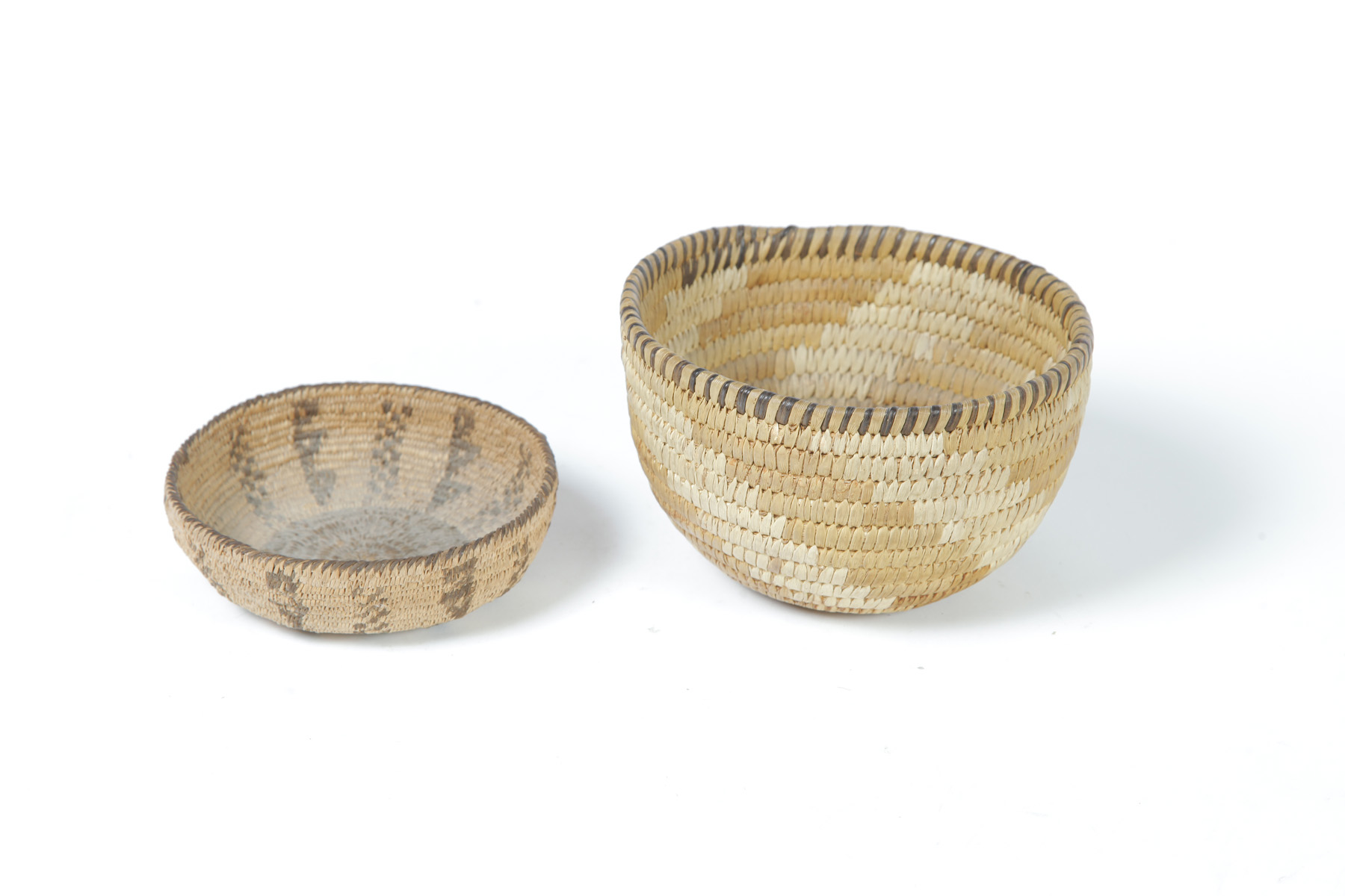 Appraisal: TWO NATIVE AMERICAN BASKETS First half- th century Both have