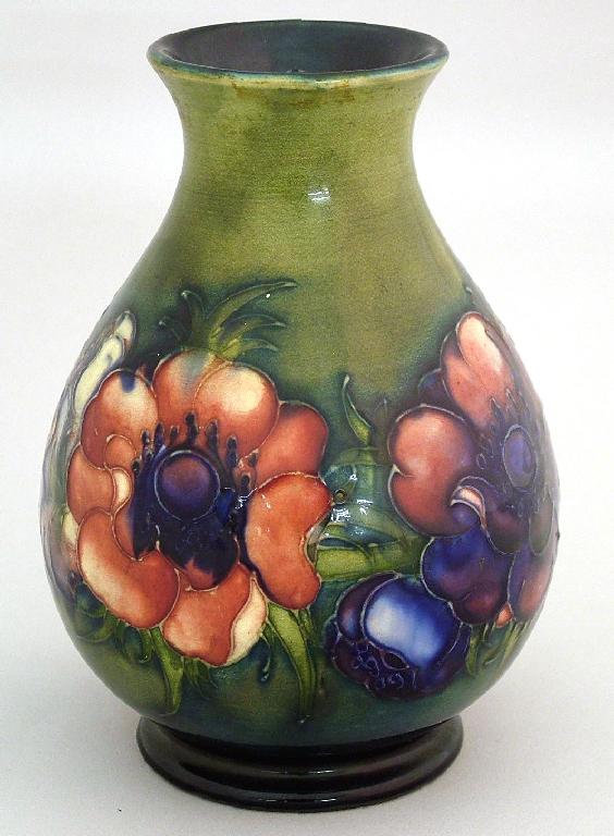 Appraisal: Moorcroft 'Anemone' ovoid vase decorated upon a mottled green-blue ground