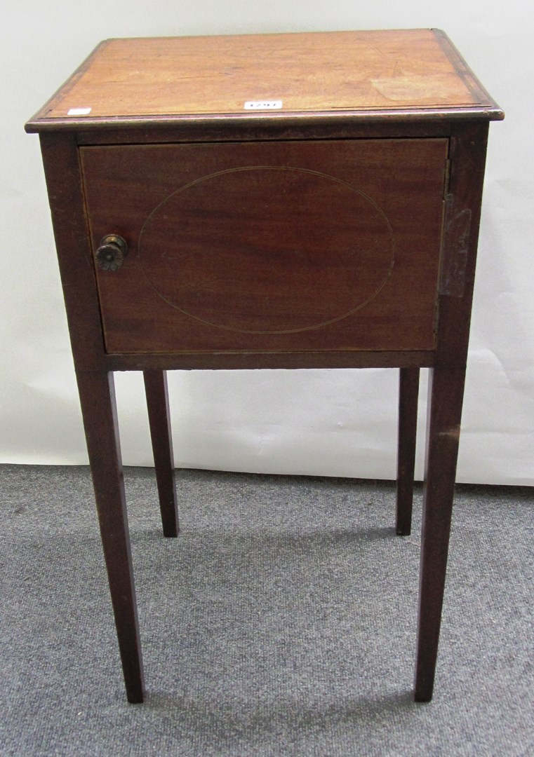 Appraisal: A th century mahogany single door night stand on tapering