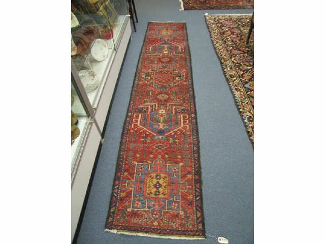 Appraisal: Heriz Persian Handmade Runner geometrics on red field ' x