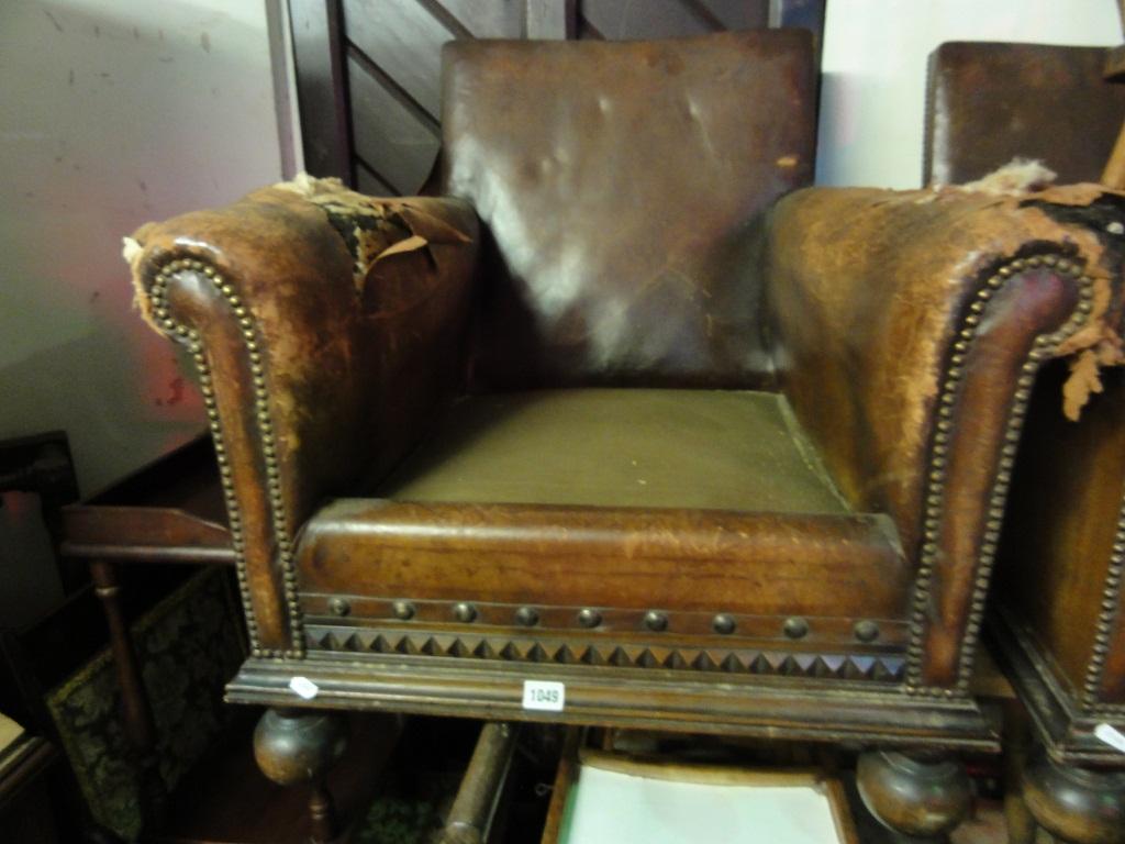 Appraisal: A pair of Edwardian 's low armchairs with leather upholstery