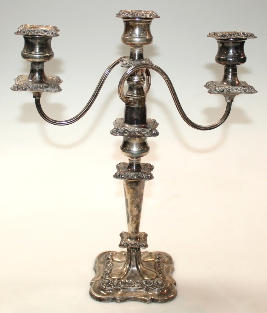 Appraisal: An early thC electroplated three branch candelabrum raised with three